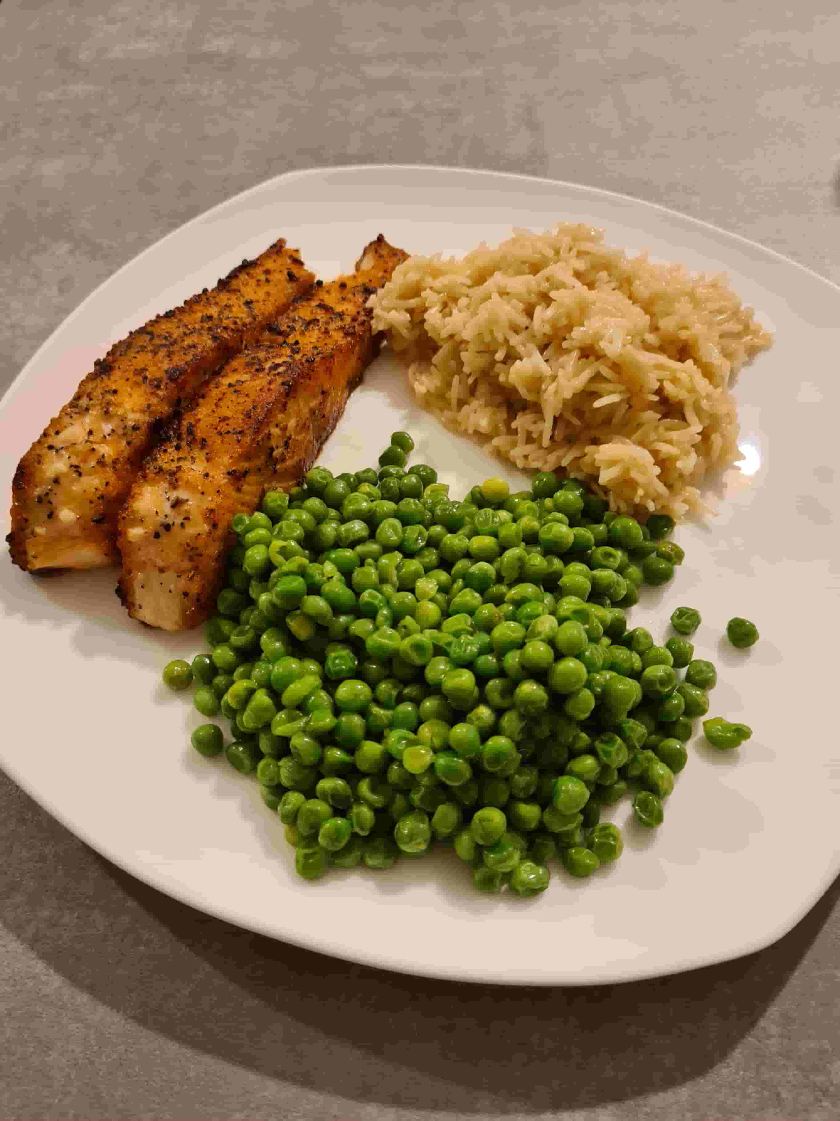 Zalm met rijst en erwten Recipe Image