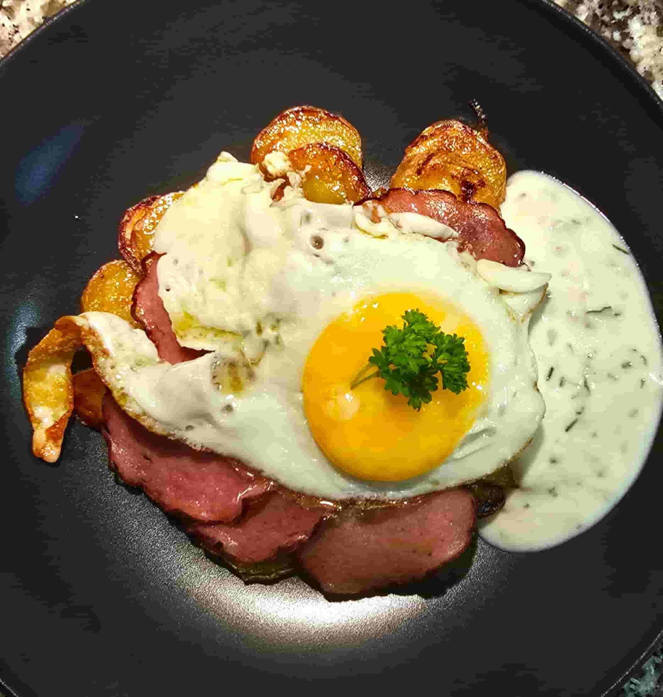Leberkäse Chips with Fried Potatoes and Fried Eggs Recipe Image