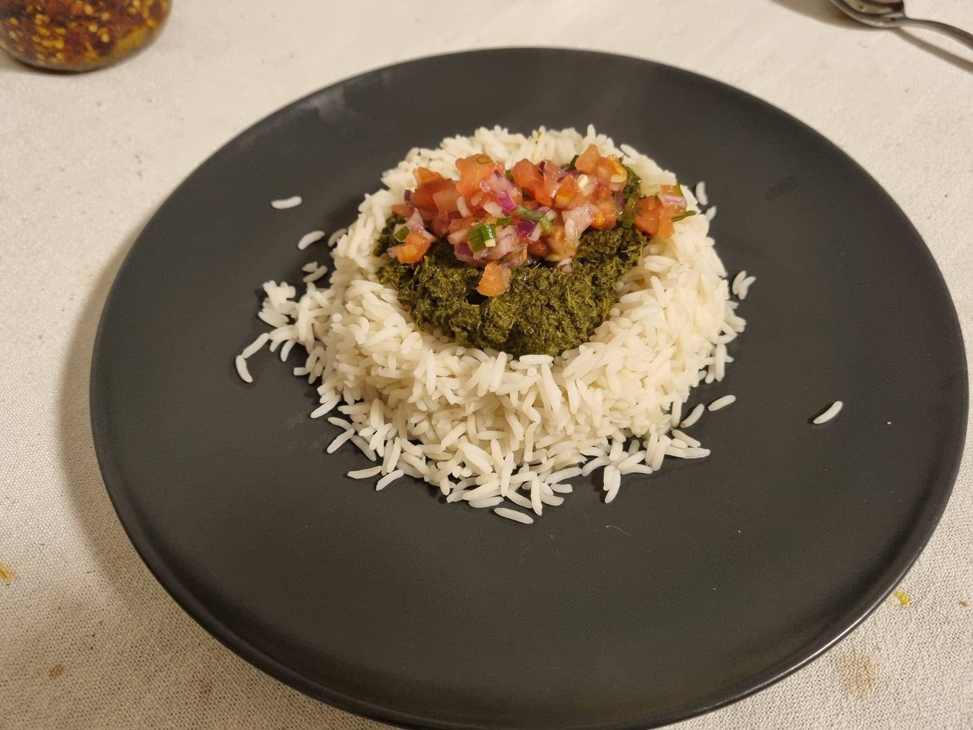 Hero Image for Ravitoto sy Henakisoa con arroz y ensalada de tomate