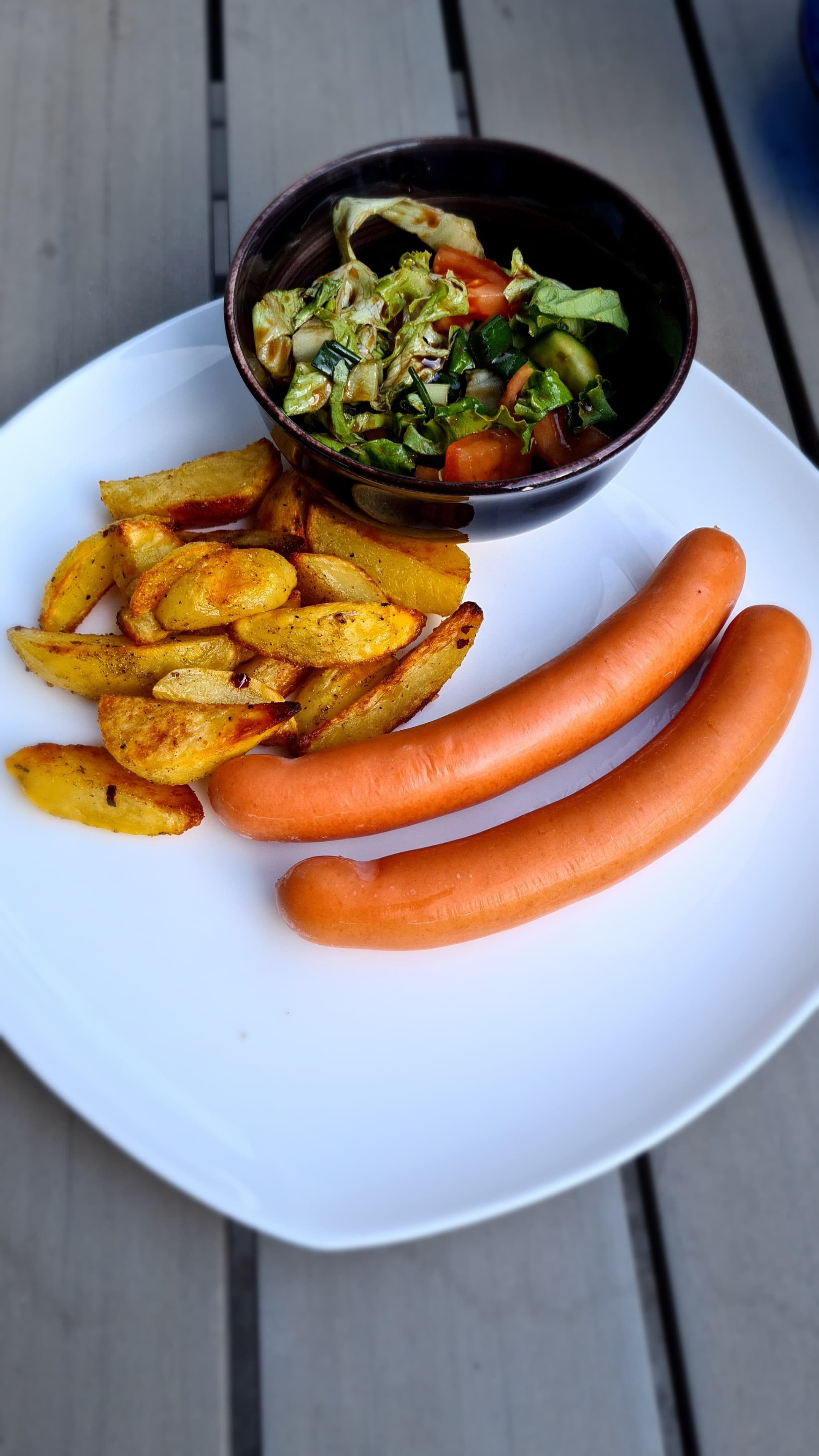 Sausages with Baked Potatoes and Fresh SaladRecipe Image