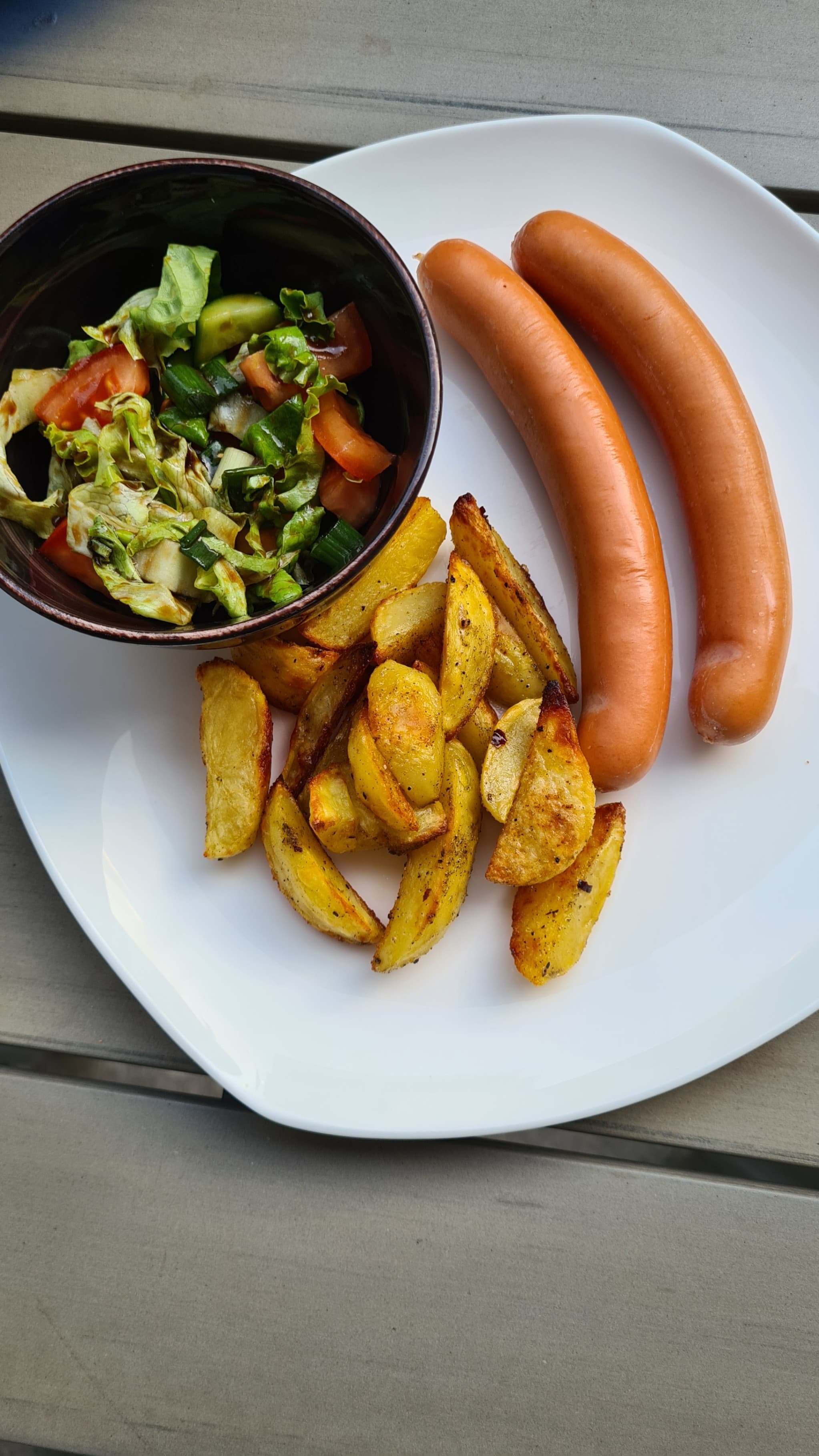 Sausages with Baked Potatoes and Fresh SaladRecipe Image