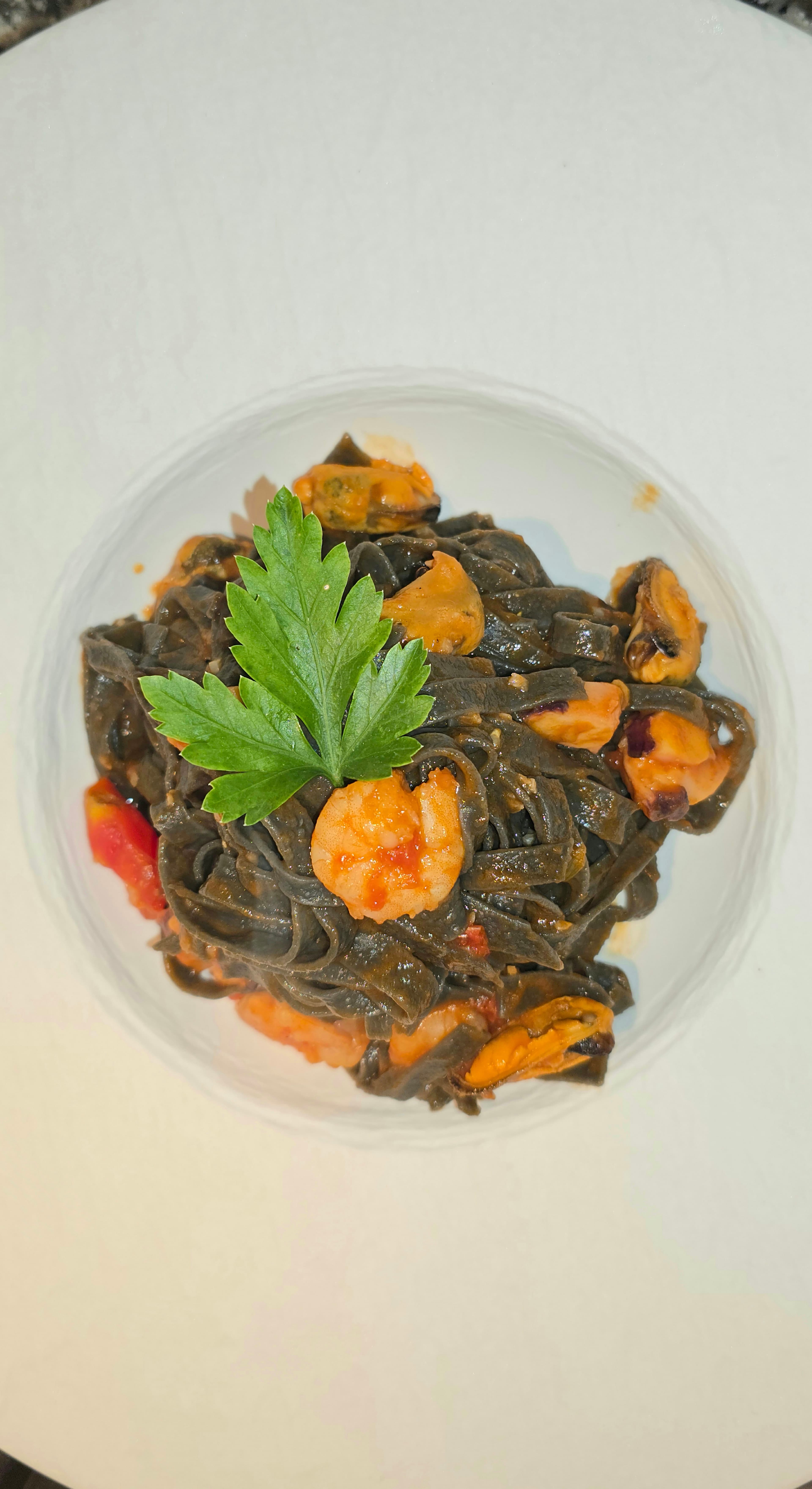 Schwarze Nudeln mit Meeresfrüchte Recipe Image